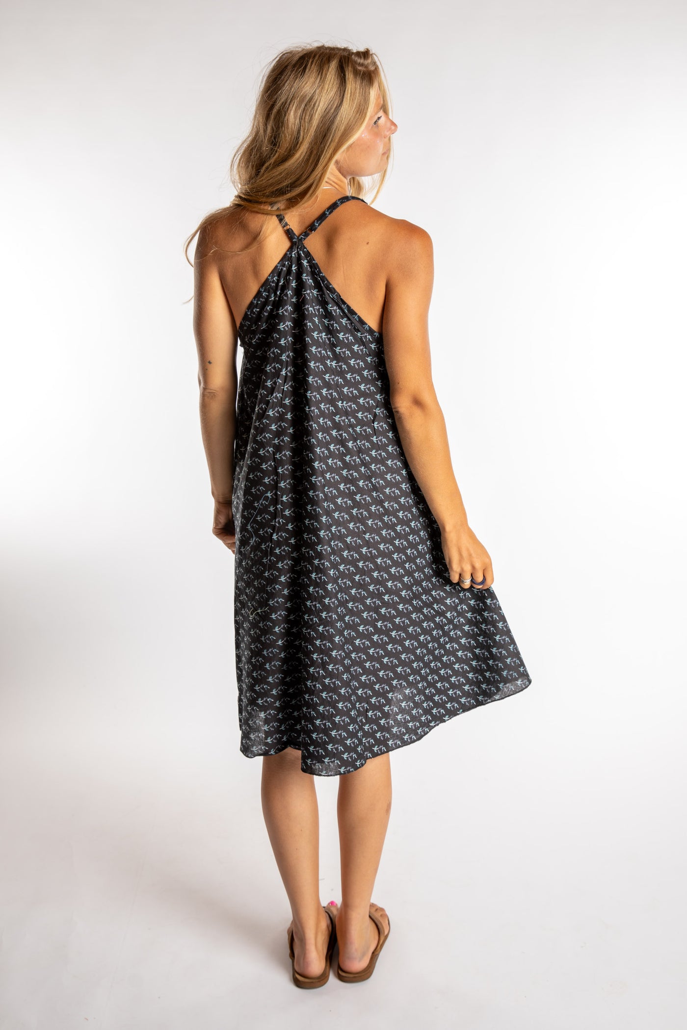 Sophie is wearing the one size Puri Printed Cotton Dress in Black