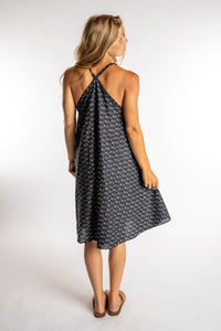 Sophie is wearing the one size Puri Printed Cotton Dress in Black
