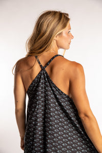 Sophie is wearing the one size Puri Printed Cotton Dress in Black