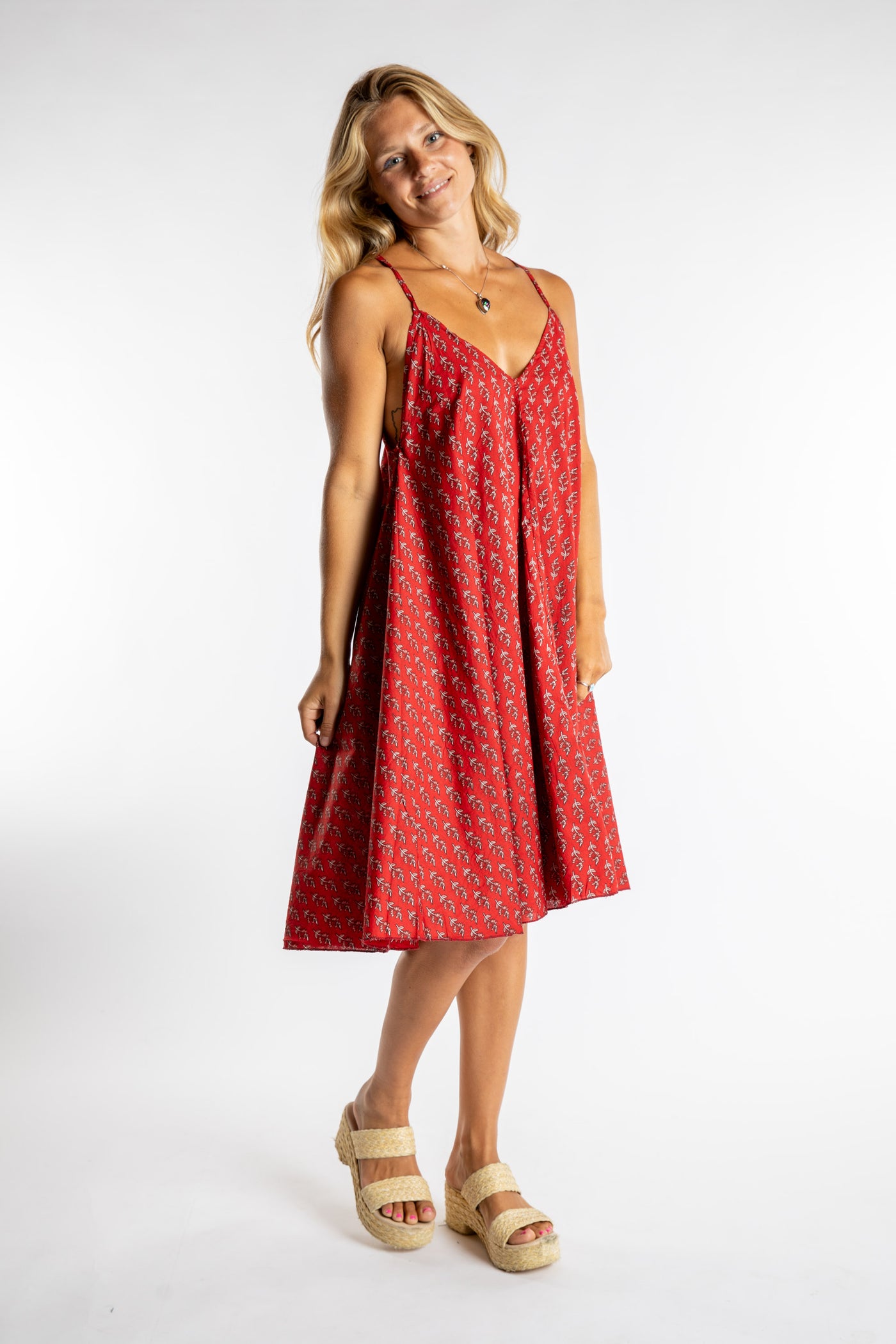 Sophie is wearing the one size Puri Printed Cotton Dress in Red