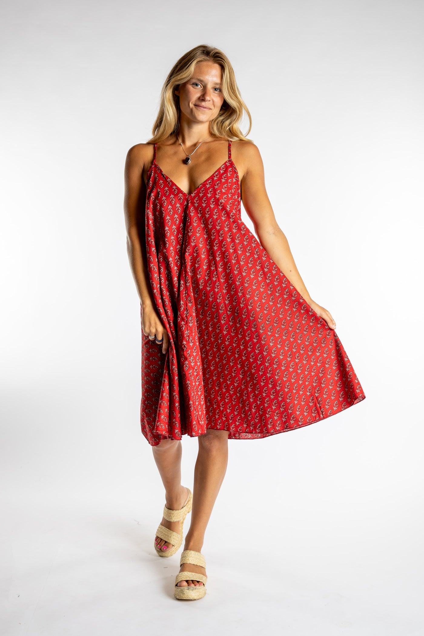 Sophie is wearing the one size Puri Printed Cotton Dress in Red