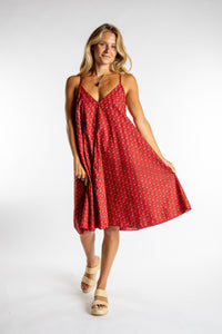 Sophie is wearing the one size Puri Printed Cotton Dress in Red