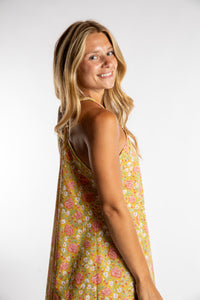 Sophie is wearing the one size Puri Printed Cotton Dress in Yellow