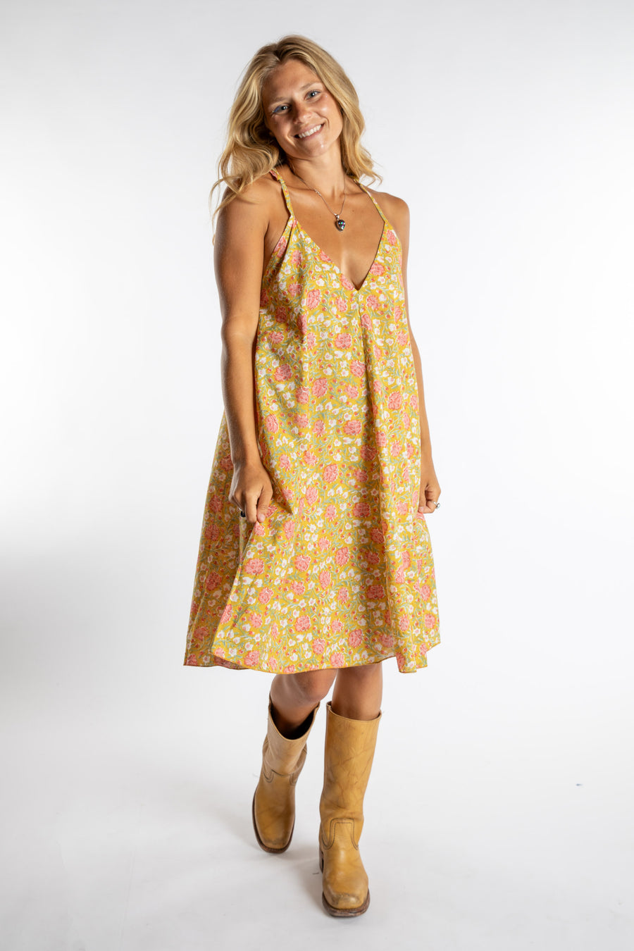 Sophie is wearing the one size Puri Printed Cotton Dress in Yellow