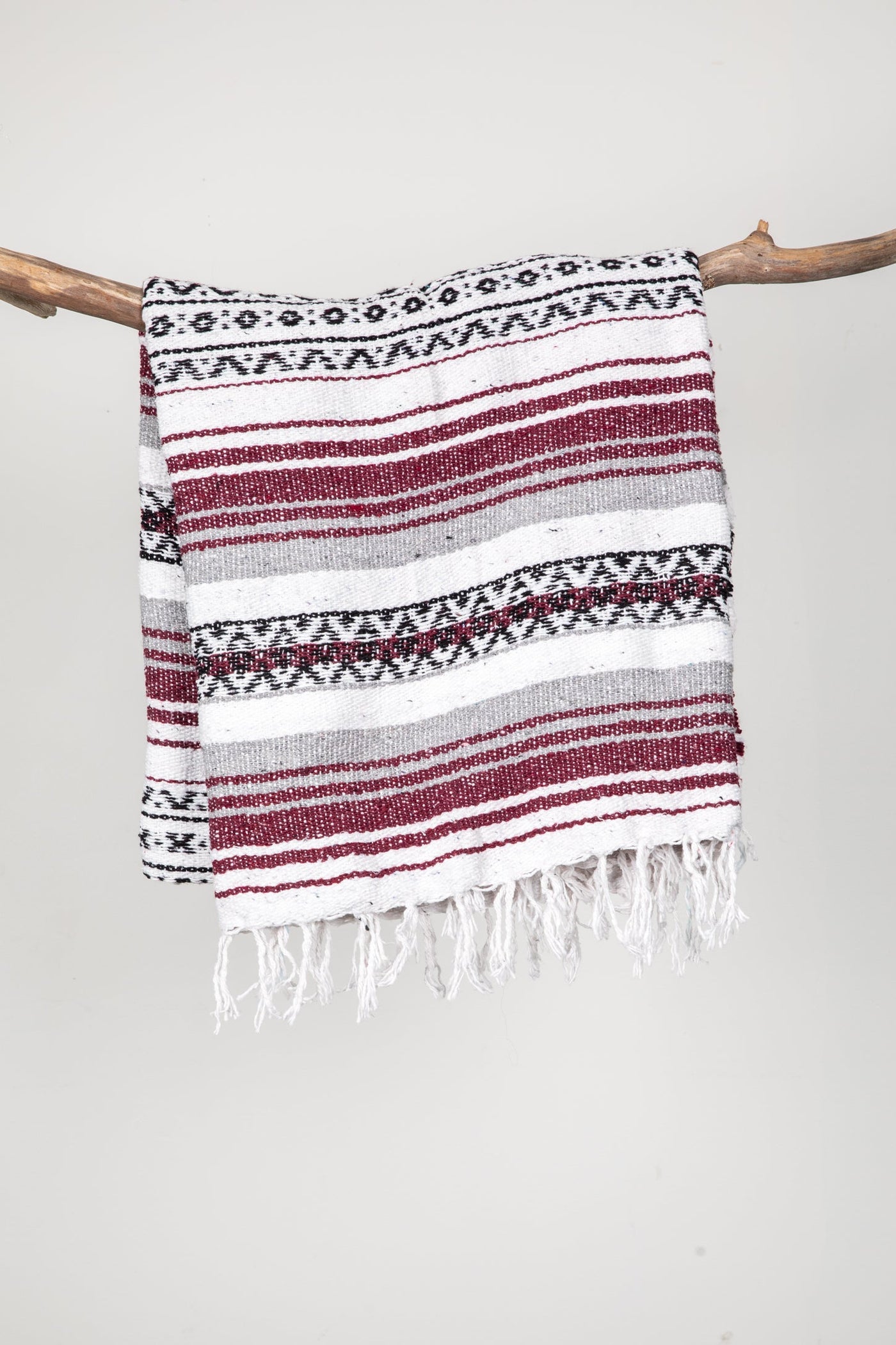 Mexican falsa blanket in maroon