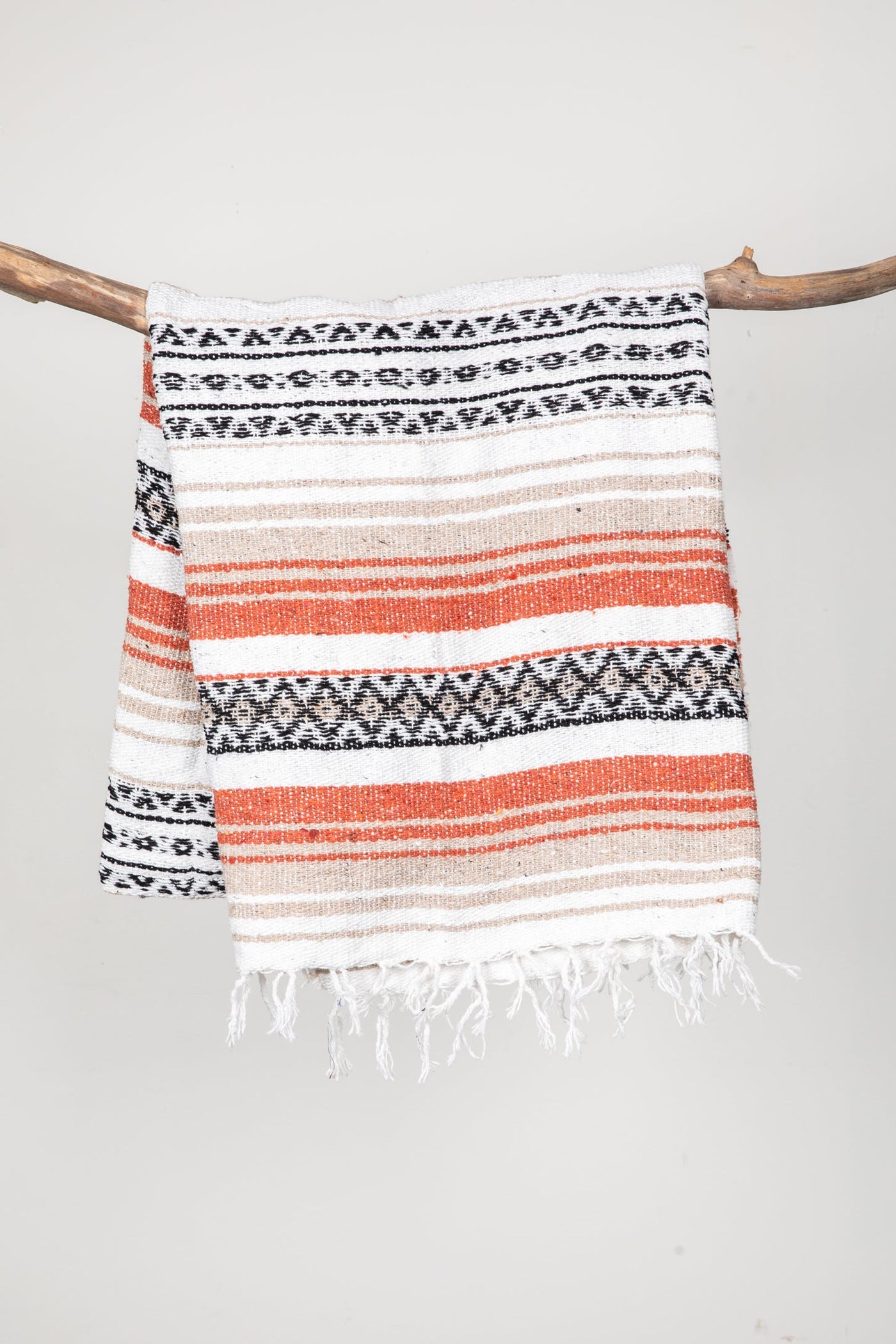Mexican falsa blanket in orange and tan