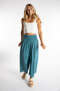Sophie is wearing the Saramati Cotton Palazzo Pants in Teal S/M