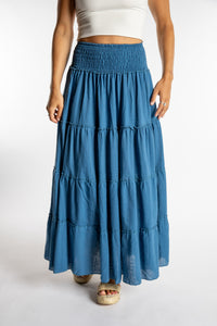 Sophie is wearing the one size Saramati Cotton Prairie Skirt in Blue