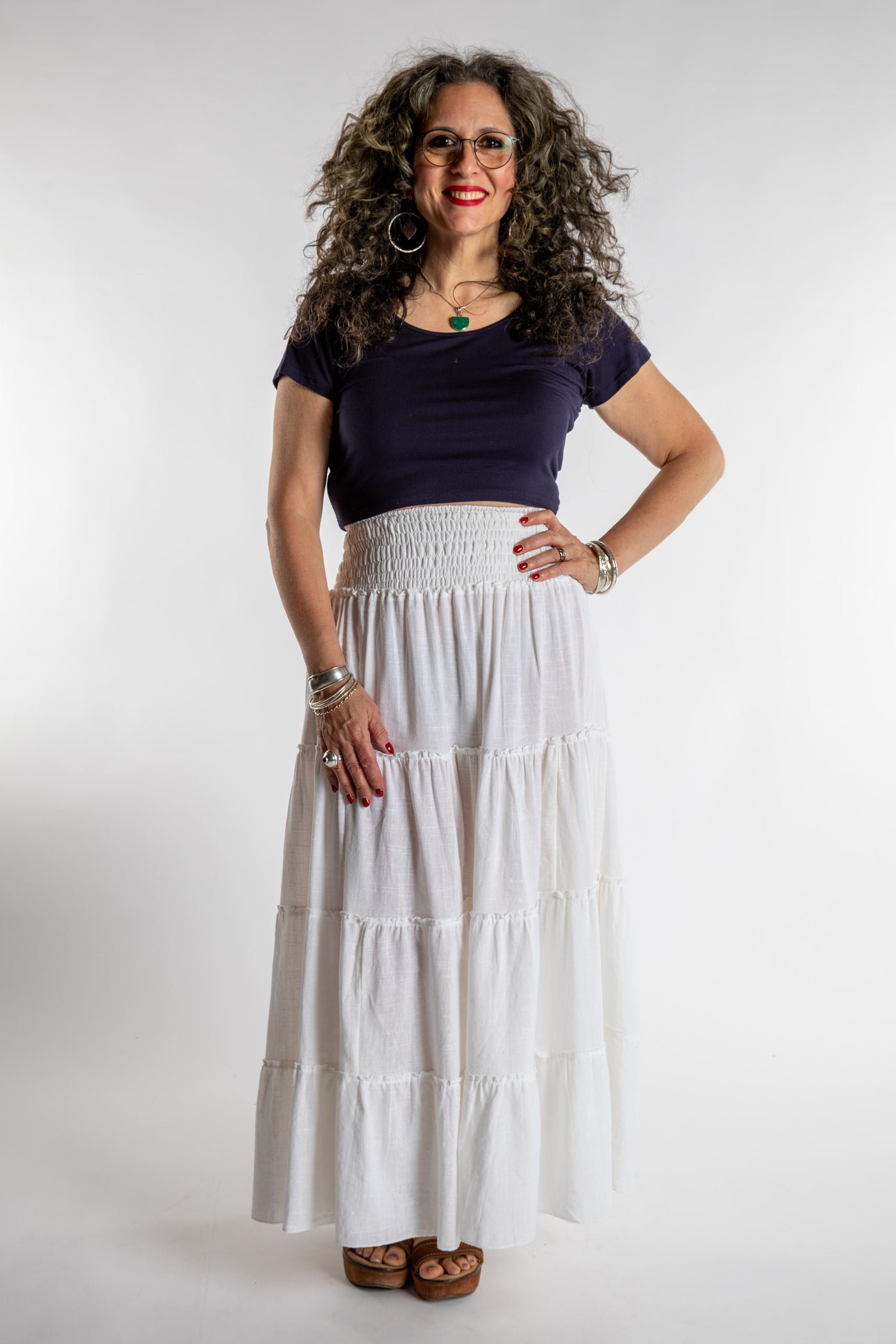Susan is wearing the Saramati Prairie Skirt in one size in Ivory