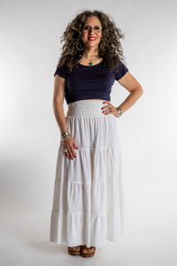 Susan is wearing the Saramati Prairie Skirt in one size in Ivory