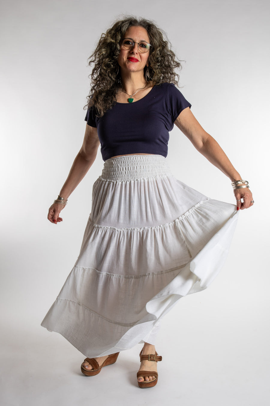 Susan is wearing the Saramati Prairie Skirt in one size in Ivory
