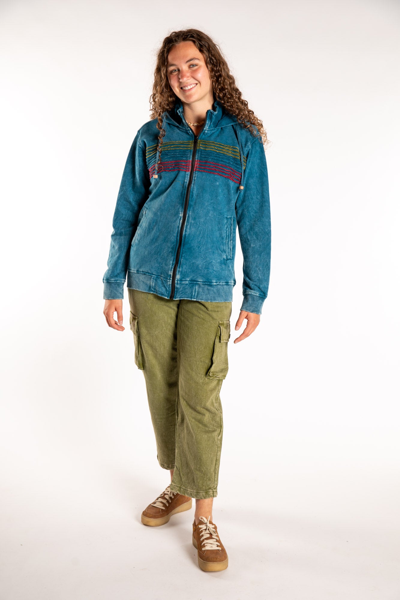 Emily is wearing the Blue Sathi Stripe ZIp Hoodie in Small