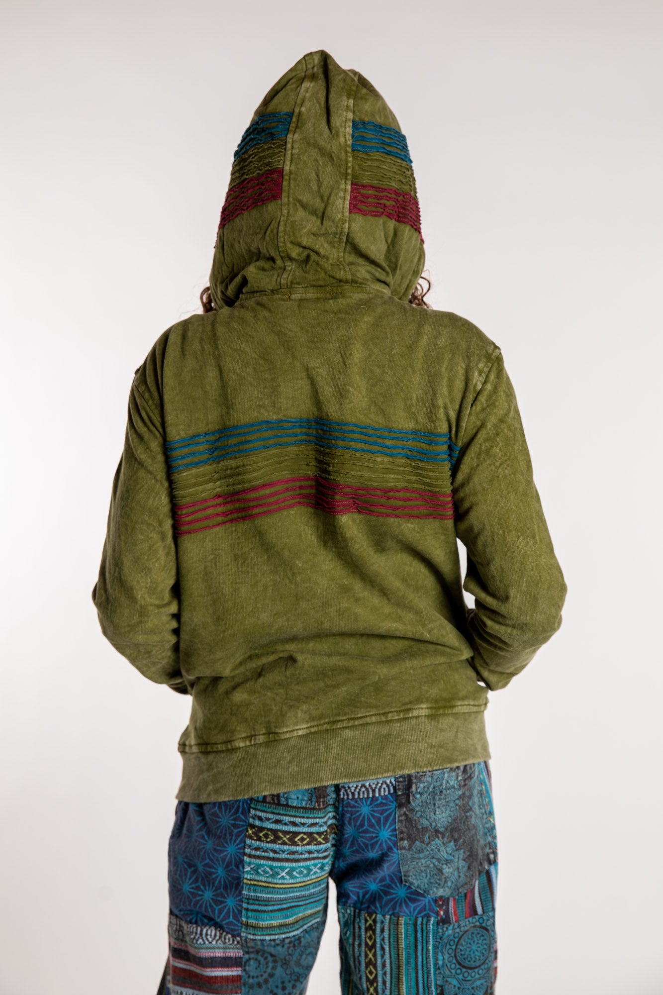 Emily is wearing the Olive Sathi Stripe ZIp Hoodie in Small