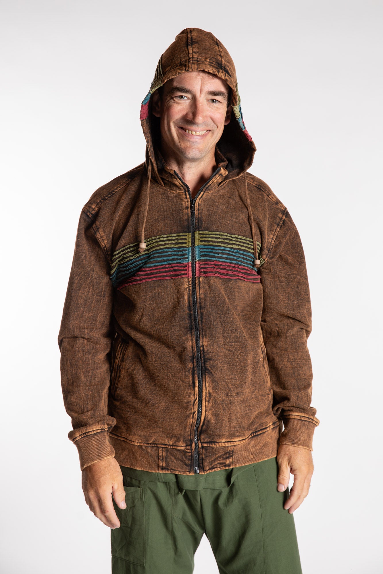 Topher is wearing the Sepia Sathi Stripe Zip Hoodie in XL