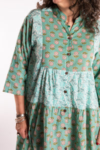 Susan is wearing the one size Shivani Tonal Cotton Tunic in Aquamarine