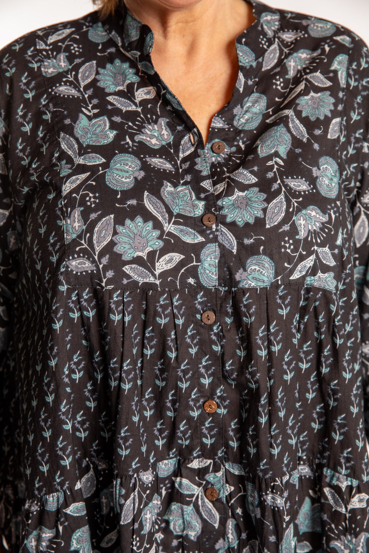 Betty is wearing the one size Shivani Tonal Cotton Tunic in Black