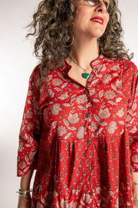 Susan is wearing the one size Shivani Tonal Cotton Tunic in Red
