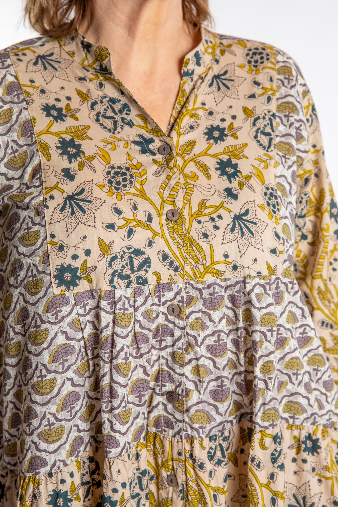 Betty is wearing the one size Shivani Tonal Cotton Tunic in Tan