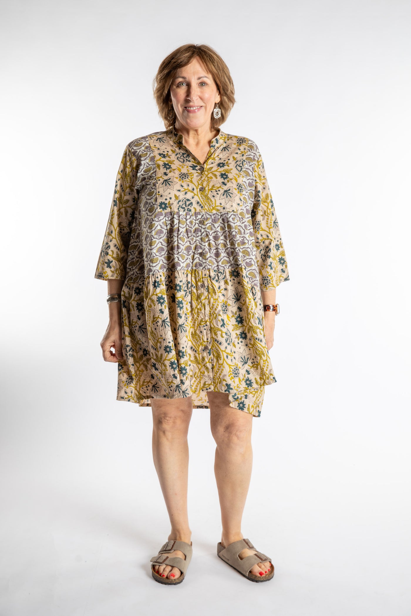 Betty is wearing the one size Shivani Tonal Cotton Tunic in Tan