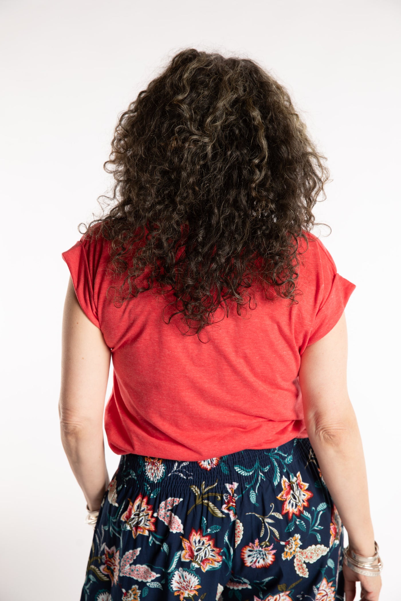Susan is wearing the Smooth Sailing T in Red in M/L
