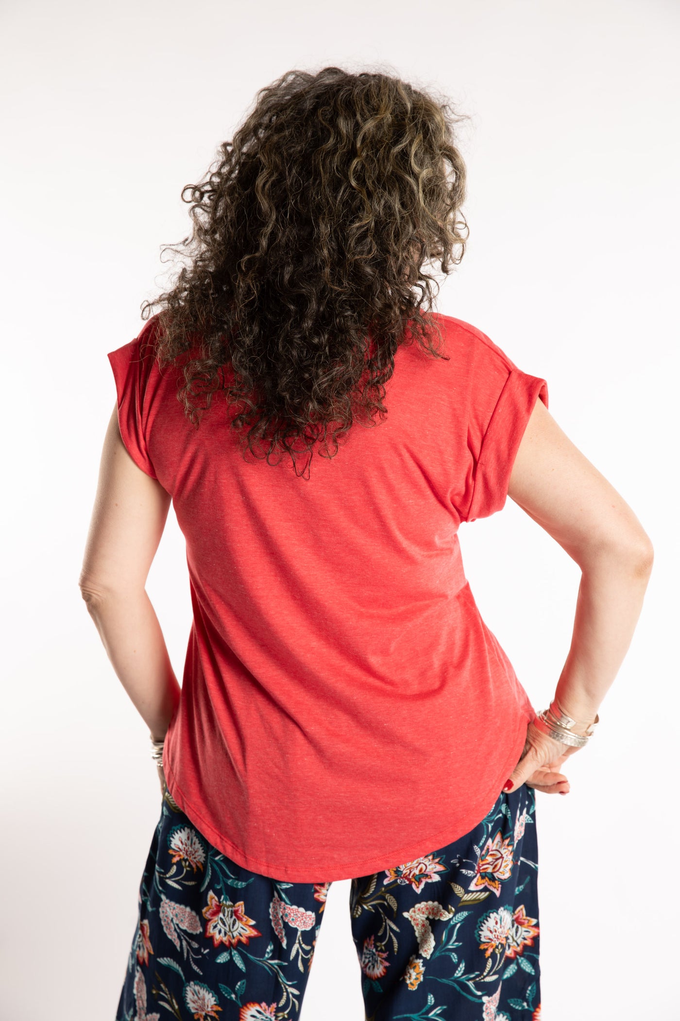 Susan is wearing the Smooth Sailing T in Red in M/L