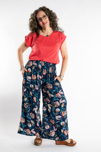 Susan is wearing the Smooth Sailing T in Red in M/L