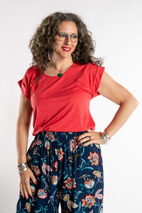 Susan is wearing the Smooth Sailing T in Red in M/L