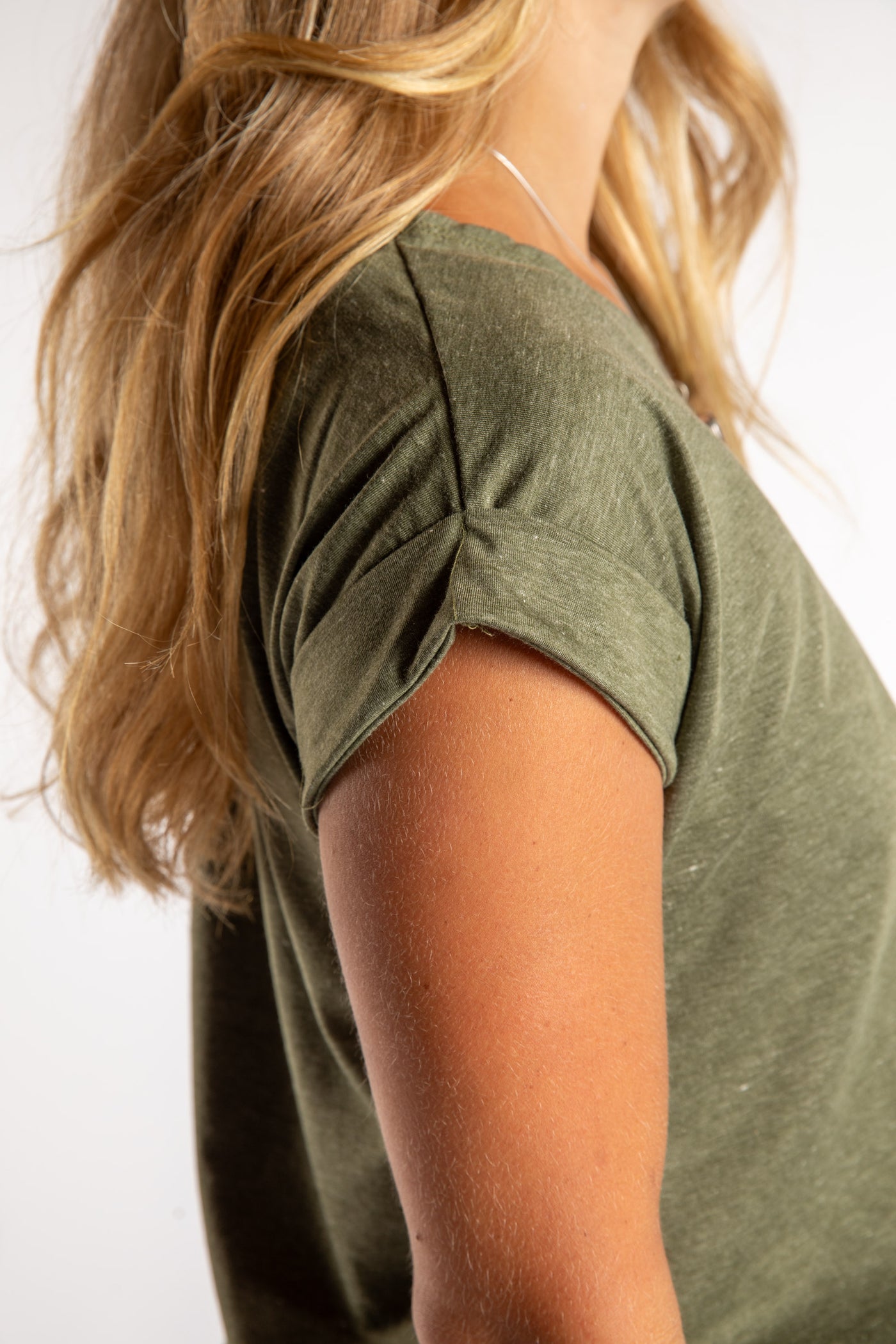 Sophie is wearing size S/M Casual Basic Tee in Green Sage