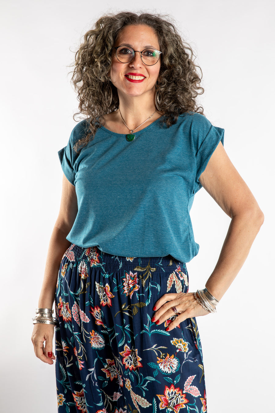 Susan is wearing the Smooth Sailing T in Teal in M/L