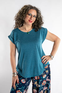 Susan is wearing the Smooth Sailing T in Teal in M/L