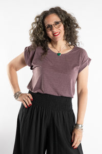 Susan is wearing the Smooth Sailing T in Violet in M/L