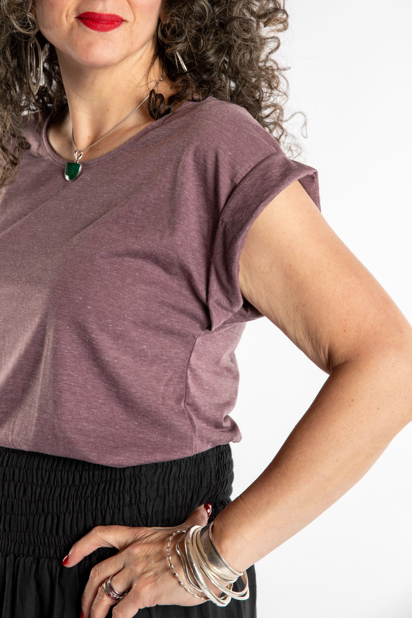 Susan is wearing the Smooth Sailing T in Violet in M/L