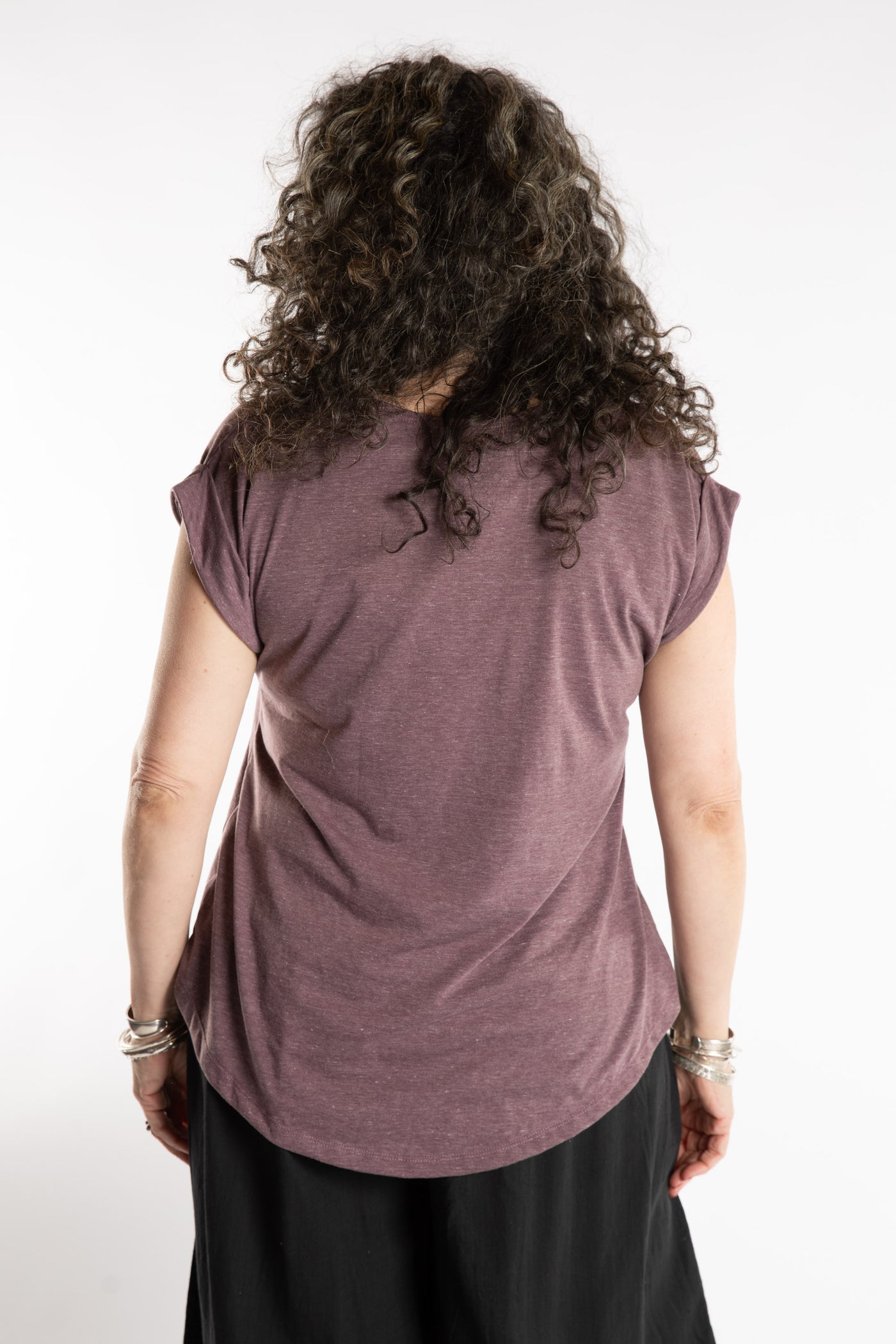 Susan is wearing the Smooth Sailing T in Violet in M/L