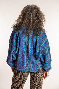 Susan is wearing the One Size Soft Brushed Stripe Top in Blue