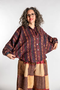 Susan is wearing the One Size Soft Brushed Stripe Top in Brown