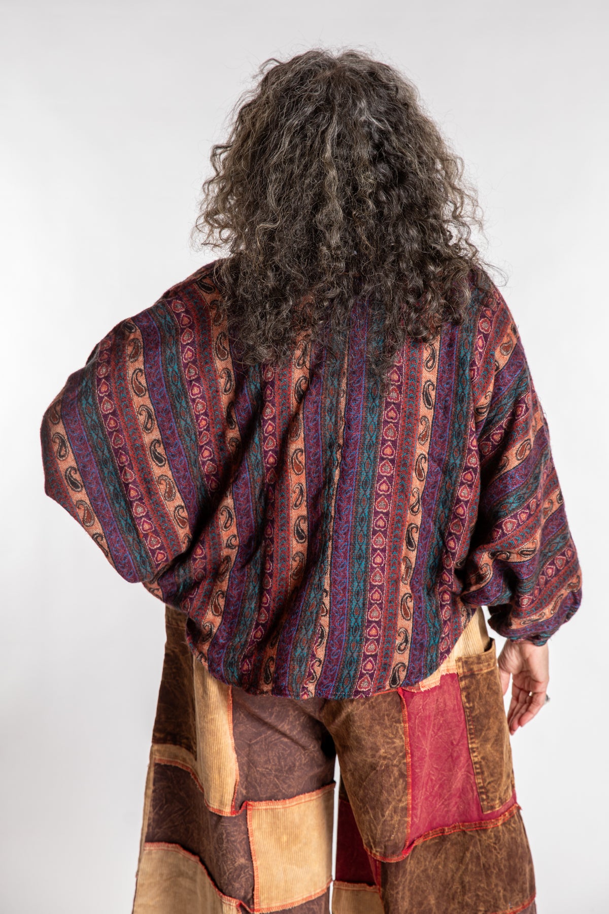 Susan is wearing the One Size Soft Brushed Stripe Top in Brown
