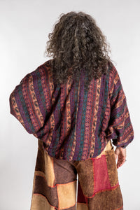 Susan is wearing the One Size Soft Brushed Stripe Top in Brown