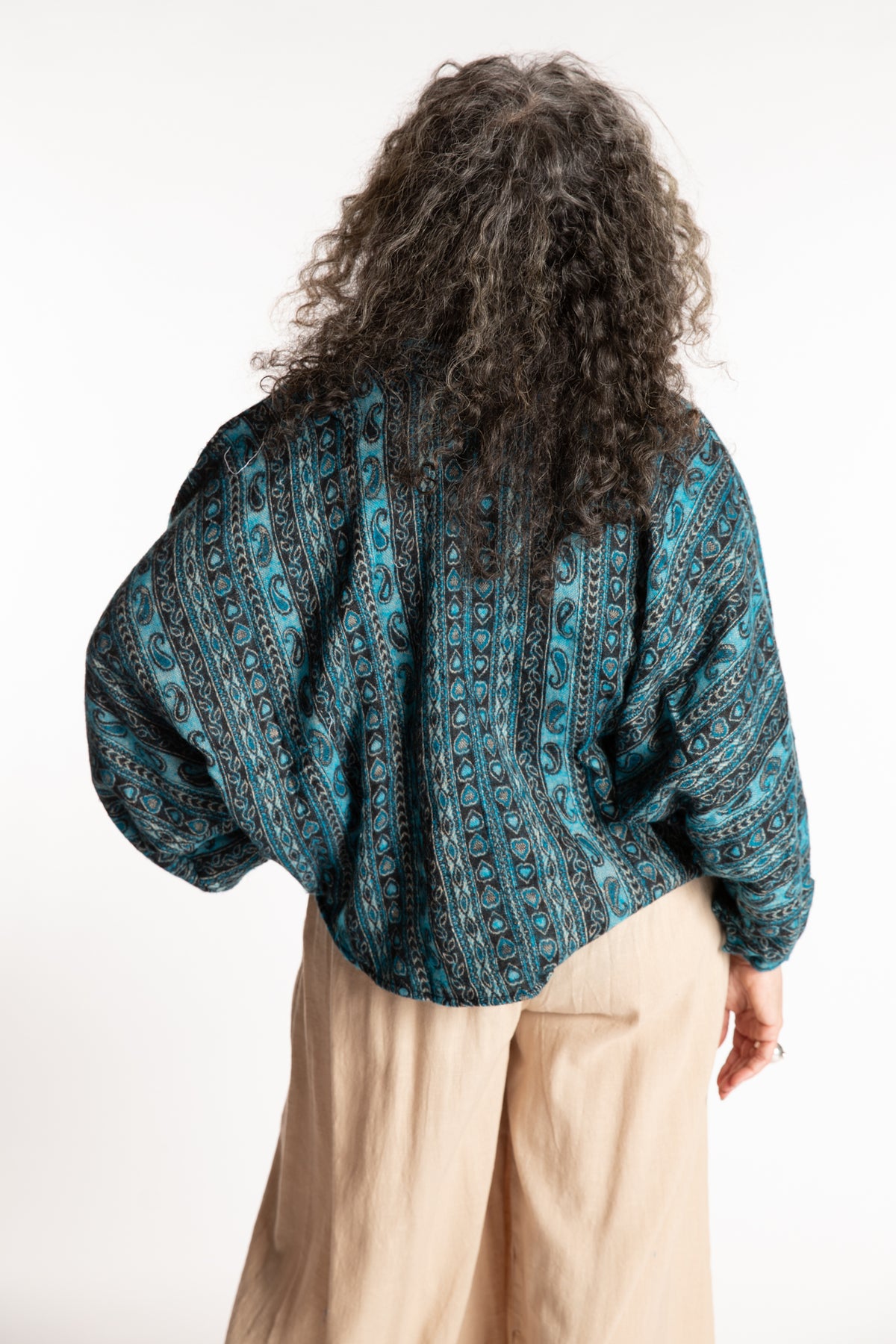 Susan is wearing the One Size Soft Brushed Stripe Top in Turquoise