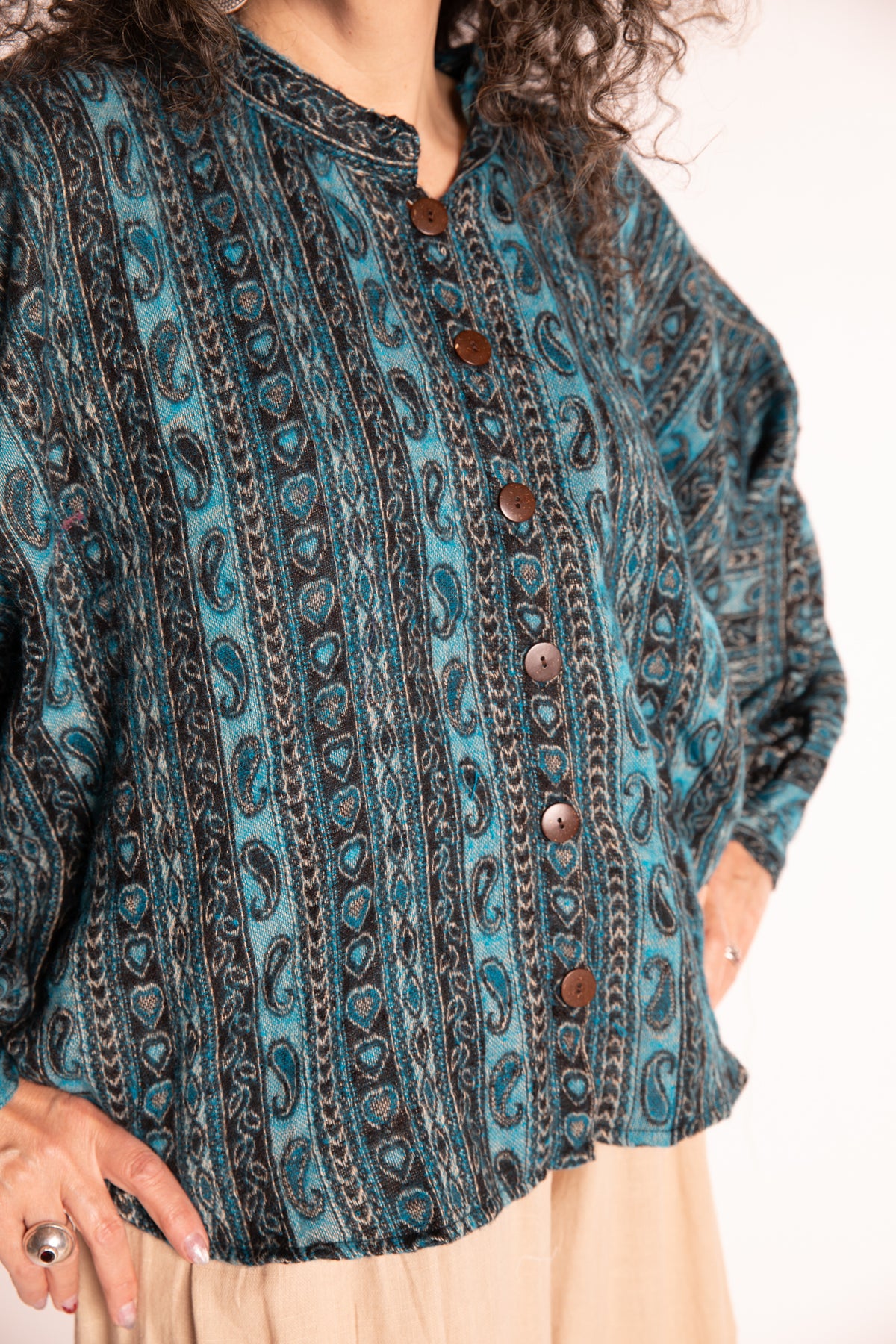 Susan is wearing the One Size Soft Brushed Stripe Top in Turquoise