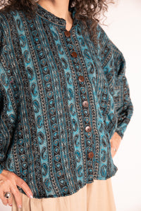 Susan is wearing the One Size Soft Brushed Stripe Top in Turquoise