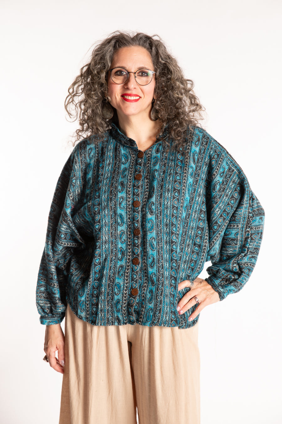 Susan is wearing the One Size Soft Brushed Stripe Top in Turquoise
