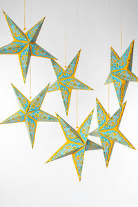 boho star decoration pack in yellow on white background