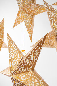 boho star decoration pack in gold on white background