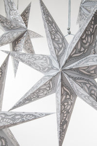 boho star decoration pack in silver on white background