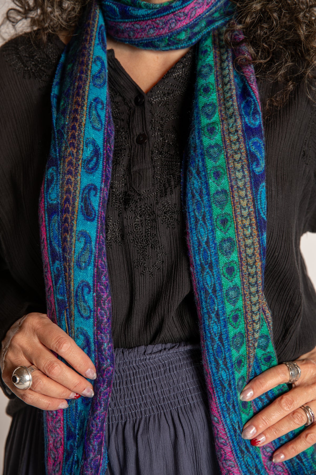 Susan is wearing the Striped Soft Brushed Scarf in Blue