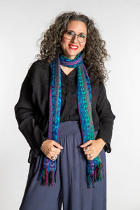 Susan is wearing the Striped Soft Brushed Scarf in Blue
