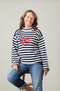 Jane is wearing size M striped lobster alpaca sweater 