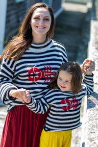 Morgaine is wearing size M striped lobster alpaca sweater. Lilly is wearing size S kids striped lobster alpaca sweater
