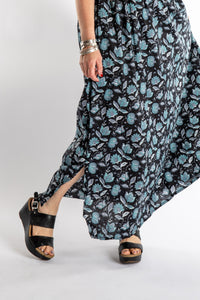 Susan is wearing the Sundara Cotton Maxi Dress in Black in M/L