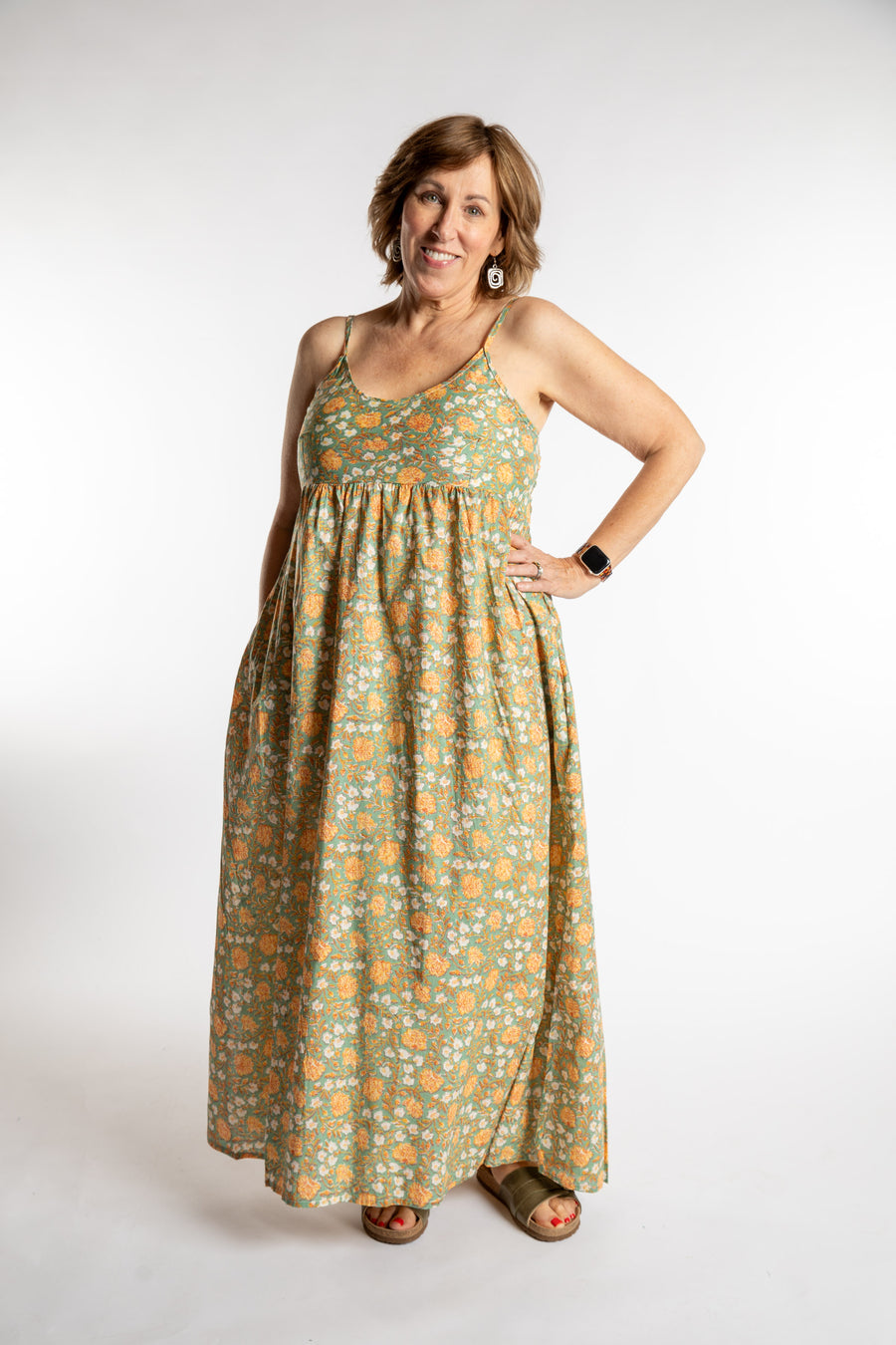 Betty is wearing the Sundara Cotton Maxi Dress in Jade in M/L